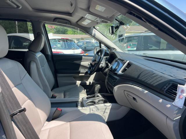 Photo 5 from auction – 2016 HONDA PILOT EXL with VIN 5FNYF6H83GB010676