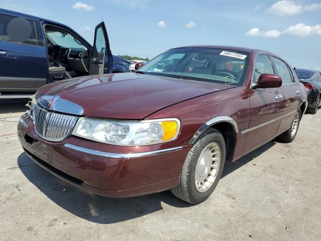 LINCOLN TOWN CAR E 2001 with VIN 1LNHM81W11Y739319 - Photo from auction