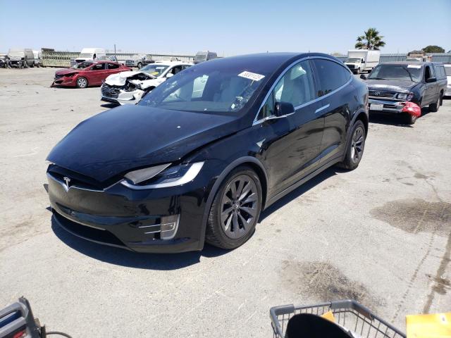TESLA MODEL X 2018 with VIN 5YJXCAE23JF141427 - Photo from auction