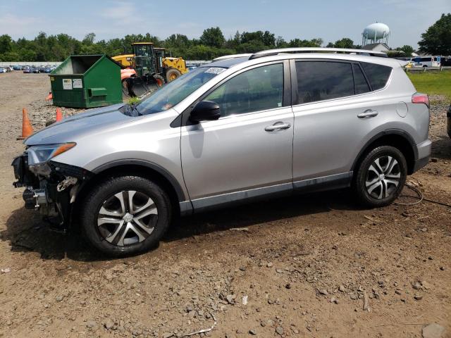 TOYOTA RAV4 LE 2018 with VIN 2T3BFREV3JW714900 - Photo from auction
