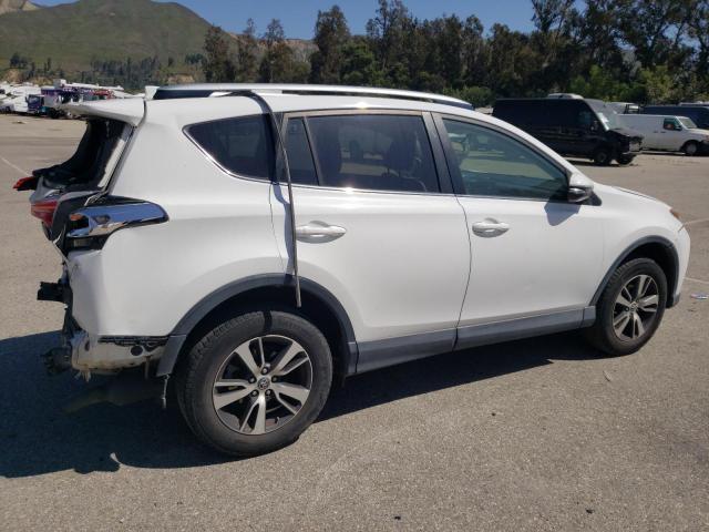 Photo 3 from auction – 2016 TOYOTA RAV4 XLE with VIN JTMWFREV8GJ085272