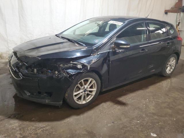 FORD FOCUS SE 2015 with VIN 1FADP3K29FL267258 - Photo from auction