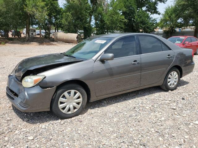 TOYOTA CAMRY LE 2004 with VIN 4T1BE32K74U869215 - Photo from auction