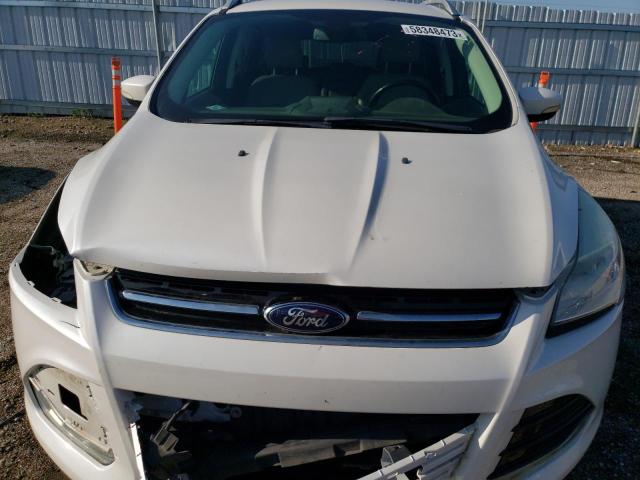 Photo 11 from auction – 2014 FORD ESCAPE TIT with VIN 1FMCU0JX0EUC21218