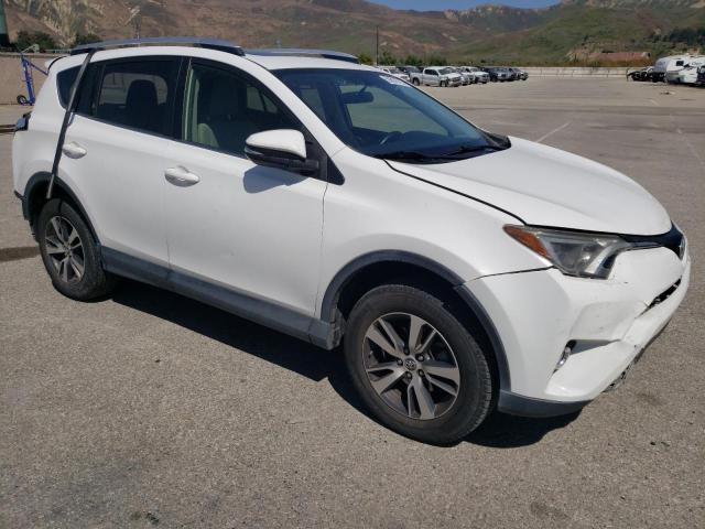Photo 4 from auction – 2016 TOYOTA RAV4 XLE with VIN JTMWFREV8GJ085272