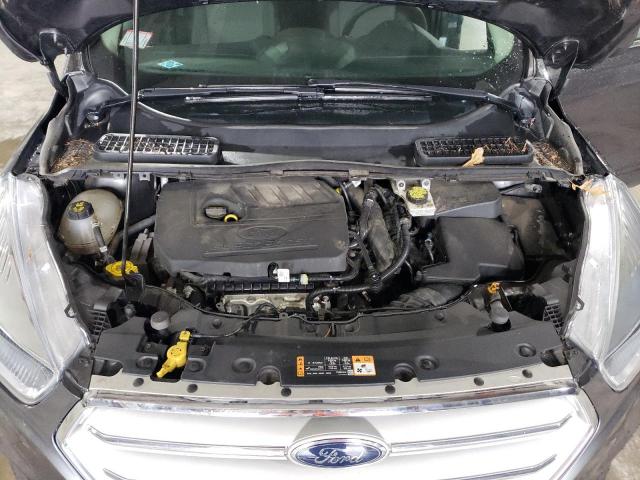 Photo 12 from auction – 2018 FORD ESCAPE SE with VIN 1FMCU9GD9JUC11427