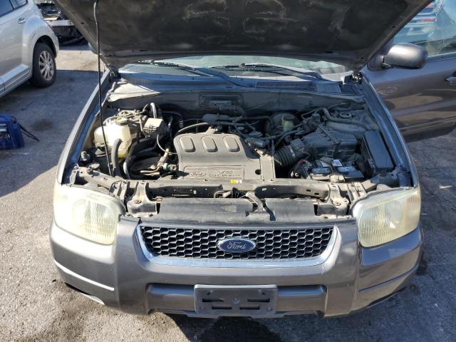 Photo 12 from auction – 2003 FORD ESCAPE LIM with VIN 1FMCU04103KD37826