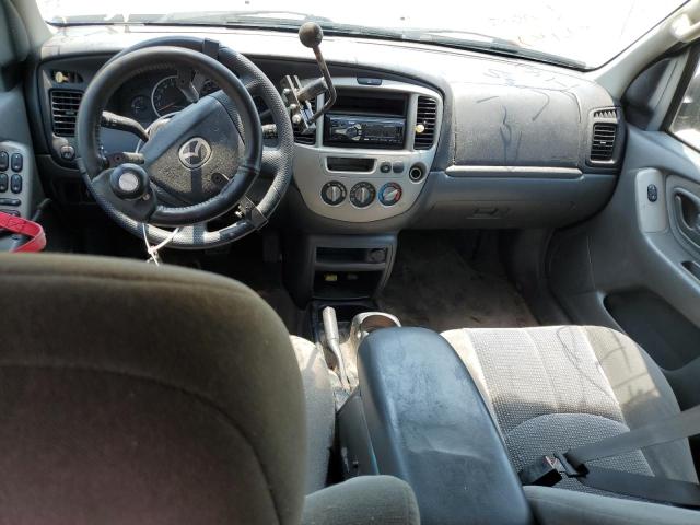 Photo 8 from auction – 2004 MAZDA TRIBUTE LX with VIN 4F2YZ04114KM22610