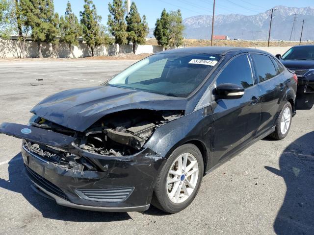 FORD FOCUS SE 2015 with VIN 1FADP3F21FL294352 - Photo from auction