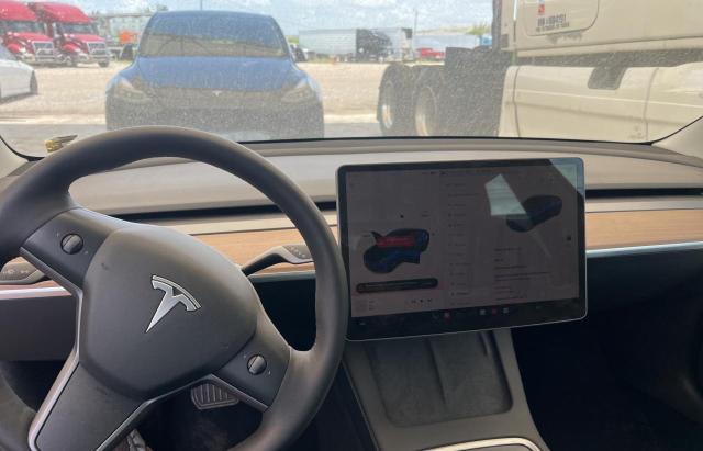 Photo 9 from auction – 2022 TESLA MODEL 3 with VIN 5YJ3E1EA8NF370725