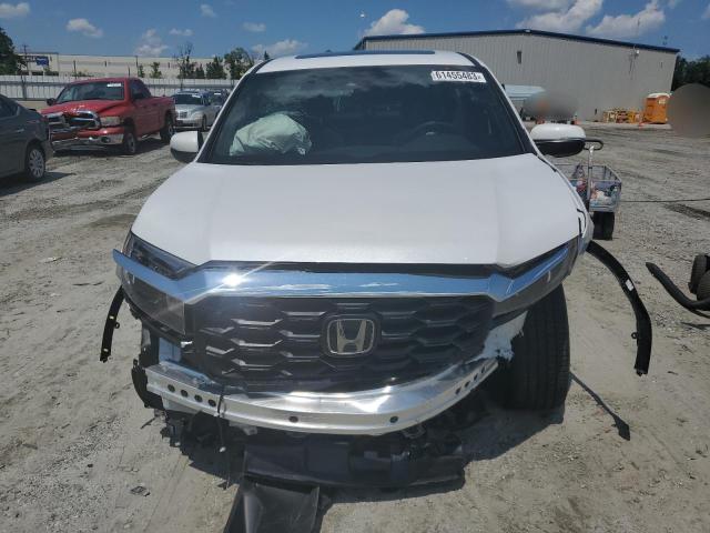 Photo 5 from auction – 2023 HONDA PASSPORT E with VIN 5FNYF8H55PB018165