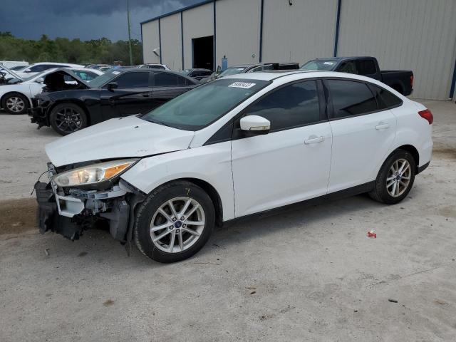 FORD FOCUS SE 2015 with VIN 1FADP3F21FL354436 - Photo from auction