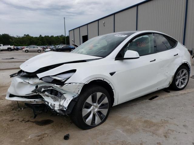 TESLA MODEL Y 2023 with VIN 7SAYGDEE8PA094344 - Photo from auction