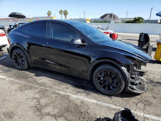 Photo 4 from auction – 2023 TESLA MODEL Y with VIN 7SAYGDEE0PA029164