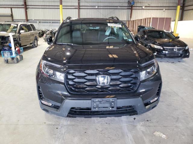 Photo 5 from auction – 2023 HONDA PASSPORT E with VIN 5FNYF8H09PB000112