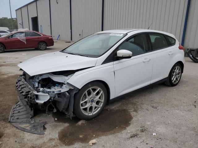 FORD FOCUS SE 2015 with VIN 1FADP3K29FL372317 - Photo from auction