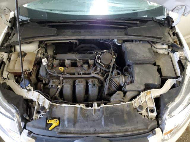 Photo 11 from auction – 2014 FORD FOCUS SE with VIN 1FADP3F21EL408459