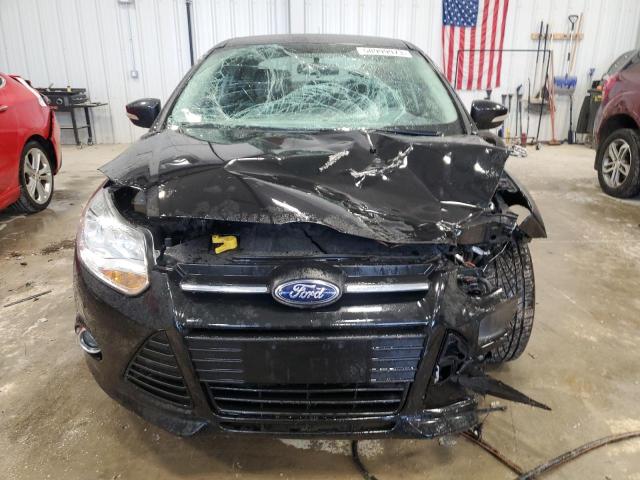 Foto 5 de la subasta – 2013 FORD FOCUS SE con VIN 1FADP3F21DL255189