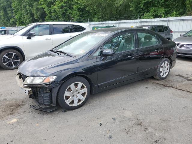 HONDA CIVIC LX 2011 with VIN 2HGFA1F59BH305562 - Photo from auction