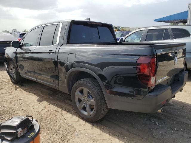 Photo 2 from auction – 2023 HONDA RIDGELINE with VIN 5FPYK3F50PB024562