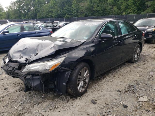 TOYOTA CAMRY LE 2017 with VIN 4T1BF1FKXHU683007 - Photo from auction