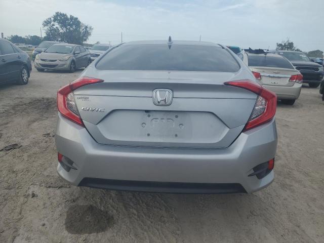 Photo 6 from auction – 2018 HONDA CIVIC EX with VIN 19XFC2F7XJE041827