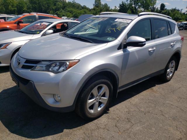 TOYOTA RAV4 XLE 2014 with VIN JTMRFREV7ED068729 - Photo from auction