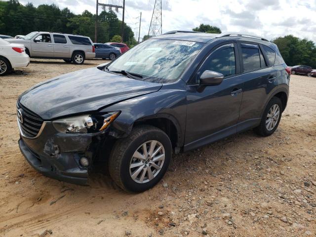 MAZDA CX-5 TOURI 2016 with VIN JM3KE2CY5G0640553 - Photo from auction