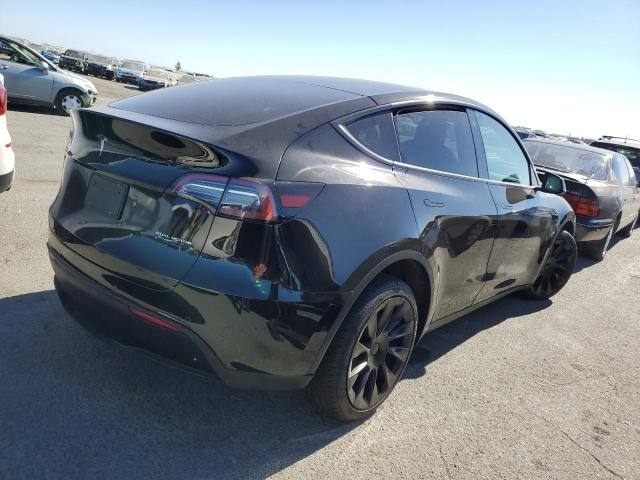 Photo 3 from auction – 2022 TESLA MODEL Y with VIN 7SAYGAEE3NF366040