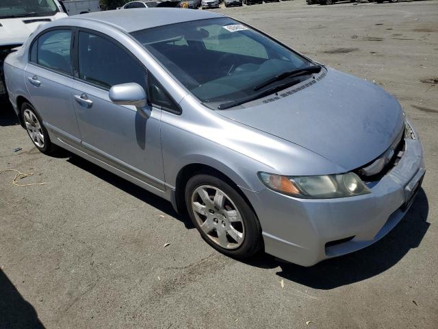 Photo 4 from auction – 2011 HONDA CIVIC LX with VIN 19XFA1F5XBE040550