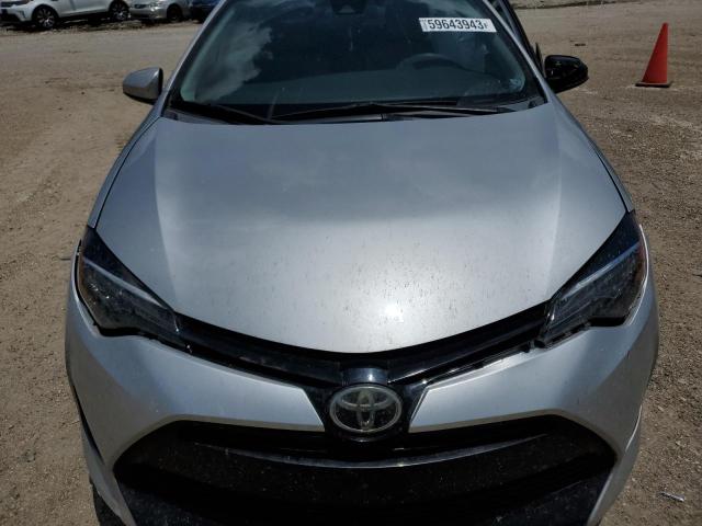 Photo 11 from auction – 2018 TOYOTA COROLLA L with VIN 5YFBURHEXJP775964