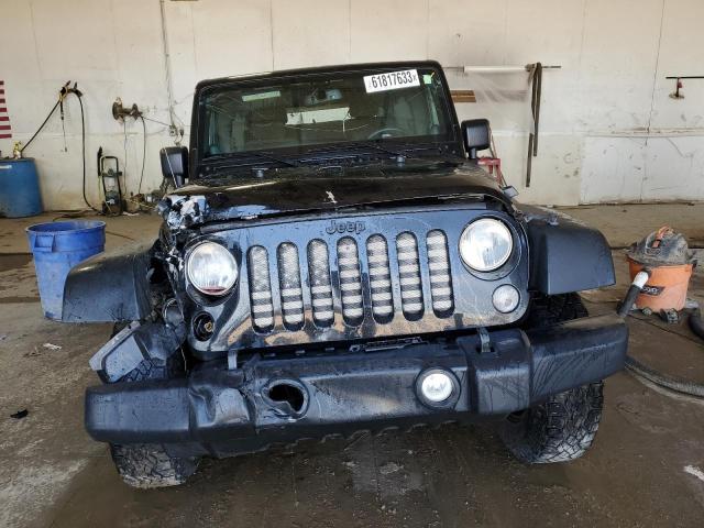 Photo 5 from auction – 2014 JEEP WRANGLER U with VIN 1C4BJWDG0EL250781