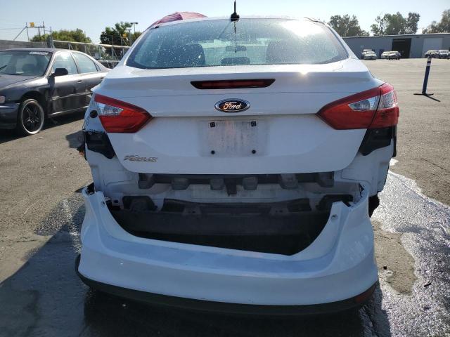 Photo 6 from auction – 2014 FORD FOCUS S with VIN 1FADP3E22EL382147