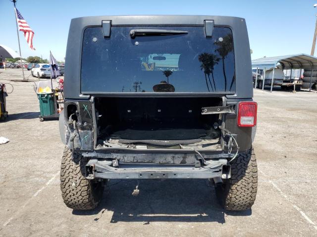 Foto 6 de la subasta – 2011 JEEP WRANGLER U con VIN 1J4BA6H13BL637093