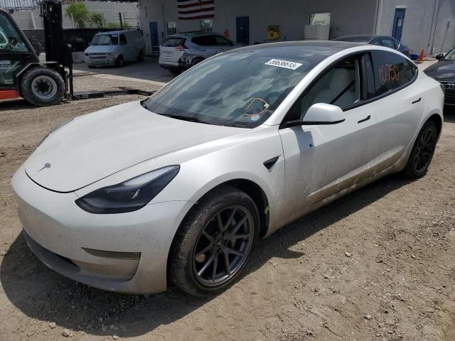 TESLA MODEL 3 2022 with VIN 5YJ3E1EBXNF305285 - Photo from auction