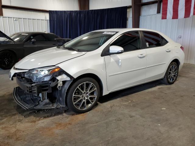 TOYOTA COROLLA L 2017 with VIN 5YFBURHE4HP634785 - Photo from auction
