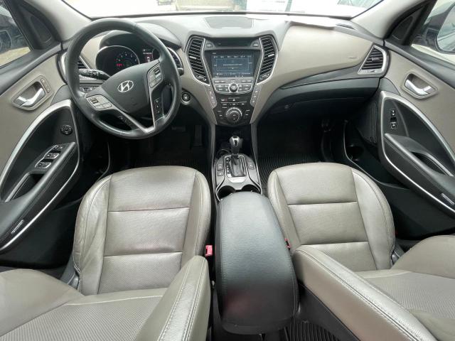 Photo 9 from auction – 2016 HYUNDAI SANTA FE S with VIN KM8SR4HF3GU133302