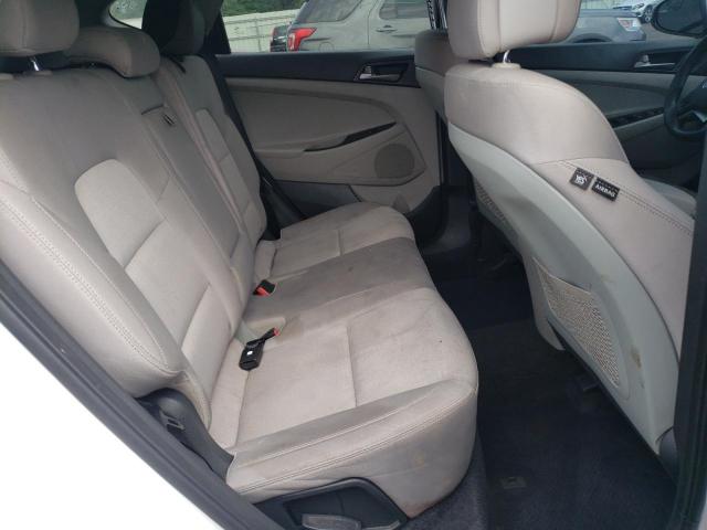 Photo 11 from auction – 2018 HYUNDAI TUCSON SE with VIN KM8J2CA41JU702464