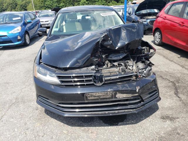 Photo 5 from auction – 2018 VOLKSWAGEN JETTA SE with VIN 3VWDB7AJ3JM219638