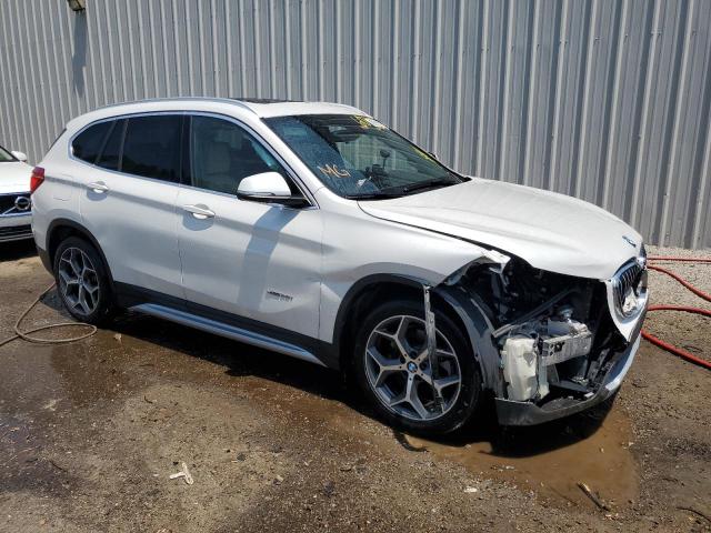 Photo 4 from auction – 2017 BMW X1 XDRIVE2 with VIN WBXHT3C36H5F79419