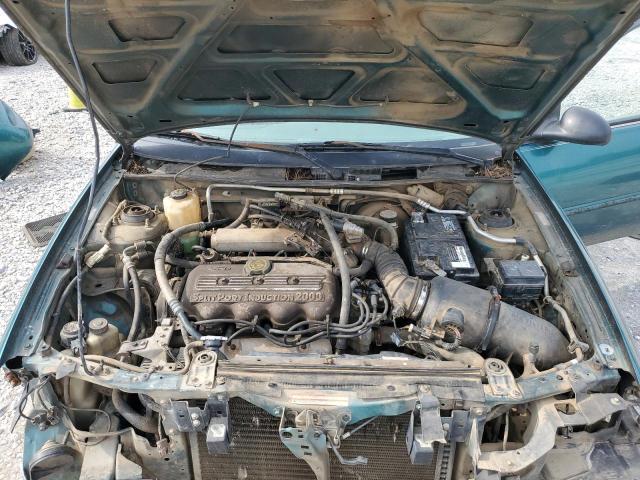 Photo 11 from auction – 1997 FORD ESCORT LX with VIN 1FALP13P7VW149961