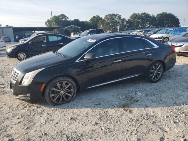 CADILLAC XTS 2013 with VIN 2G61W5S3XD9107014 - Photo from auction
