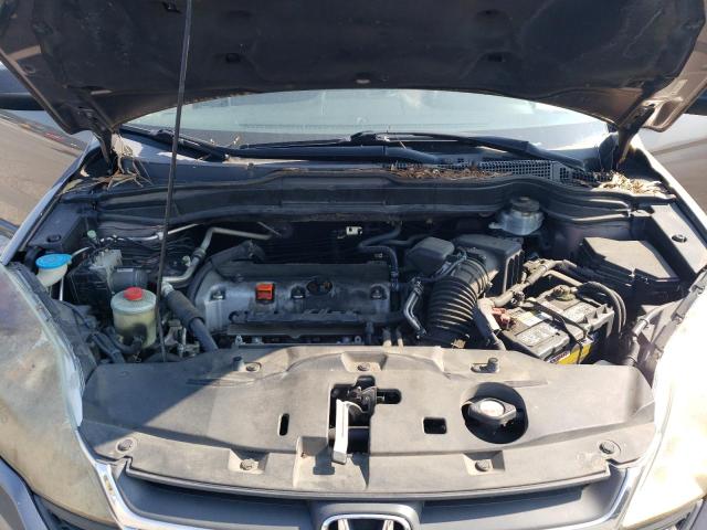 Photo 11 from auction – 2011 HONDA CR-V LX with VIN 5J6RE3H33BL039458