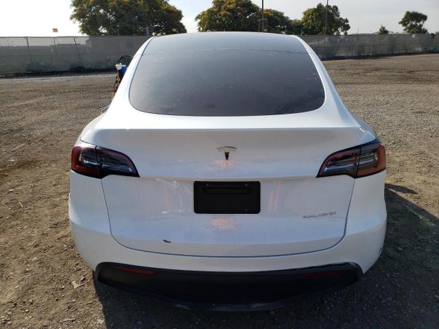 Photo 6 from auction – 2023 TESLA MODEL Y with VIN 7SAYGAEE7PF777654