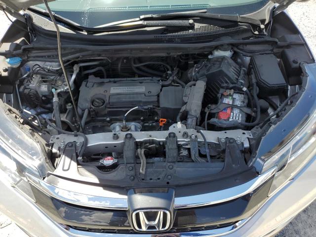 Photo 11 from auction – 2015 HONDA CR-V EX with VIN 3CZRM3H57FG704479