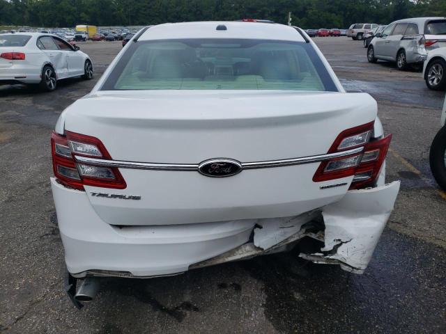 Photo 6 from auction – 2014 FORD TAURUS SE with VIN 1FAHP2D80EG159678