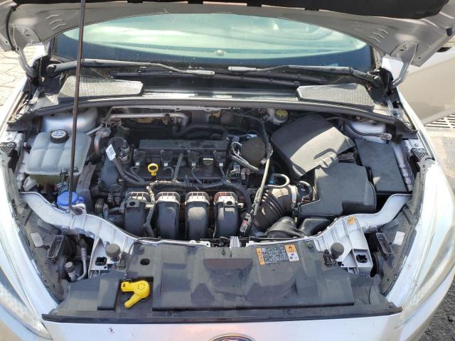 Photo 11 from auction – 2015 FORD FOCUS SE with VIN 1FADP3F25FL232324