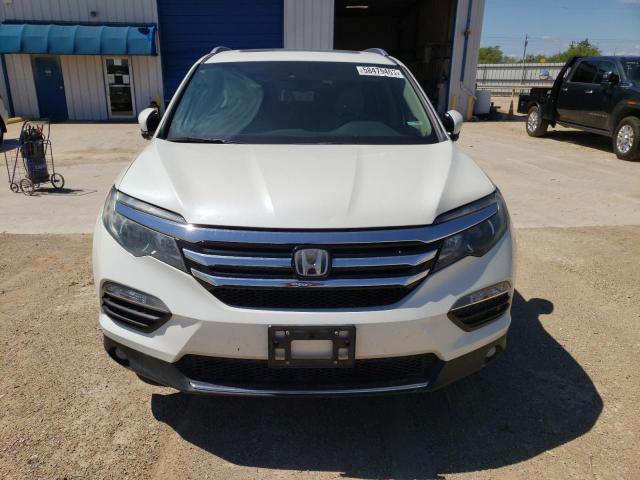 Photo 5 from auction – 2016 HONDA PILOT TOUR with VIN 5FNYF5H90GB010833