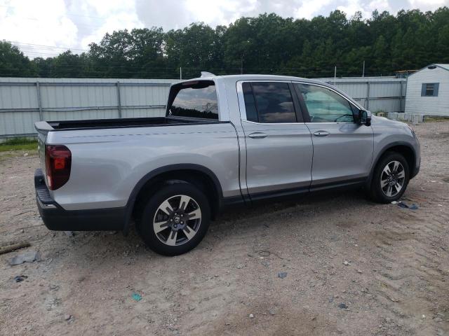 Photo 3 from auction – 2018 HONDA RIDGELINE with VIN 5FPYK2F67JB003329