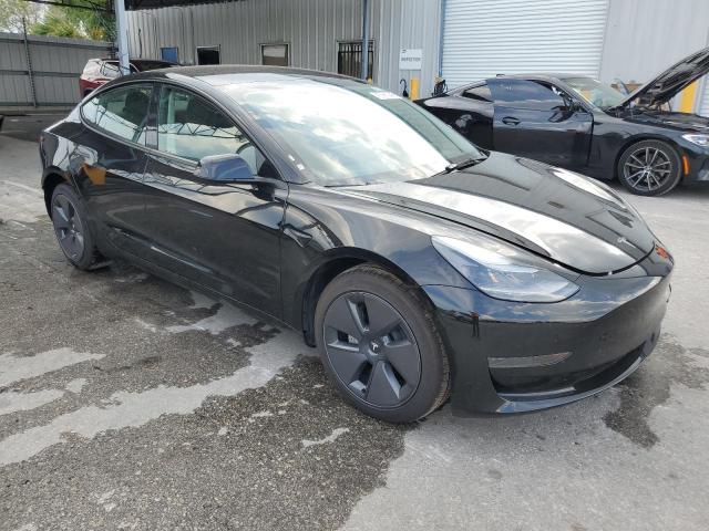 Photo 4 from auction – 2023 TESLA MODEL 3 with VIN 5YJ3E1EA8PF453722